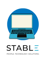 Stable logo beneath a light blue laptop that is open. This is placed in front of a blue circle